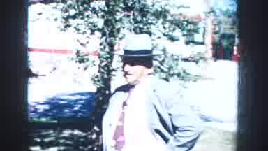 South Dakota (1953): A Man In Suit And A Hat Walks Towards A Horse