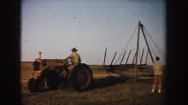South Dakota (1953): An Old-Fashioned Tractor And Farming Demonstration In A Field