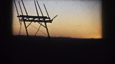 South Dakota (1953): View Of Black Object Silhouette Against Gold Sunset On A