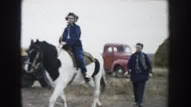 South Dakota (1953): Picture Shows A Cow First Then A Woman Riding A Show Horse
