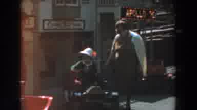 Knotts Berry Farm California-1961: Women Watching Child Play in Ride-On Car