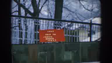 GREECE-1962: View Of Red Sign On Stone Wall In Snowy Winter