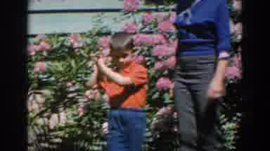 Greece (1962): A Small Blond Boy In A Red Shirt And Blue Pants