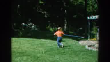 GREECE-1962: Boy Runs From Mum And Grandma In Backyard