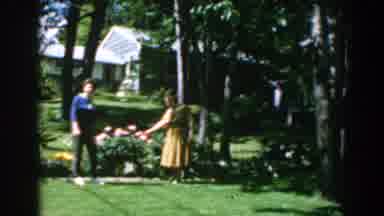 Greece (1962): Two Women Appreciating Her New Backyard Garden