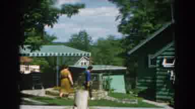 GREECE-1962: Woman and Boy in Garden Near Green House