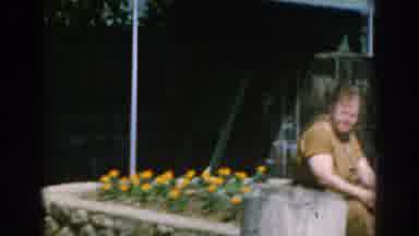 Greece (1962): Two Women Sat On A Small Wall In A Garden Talking Before Standing