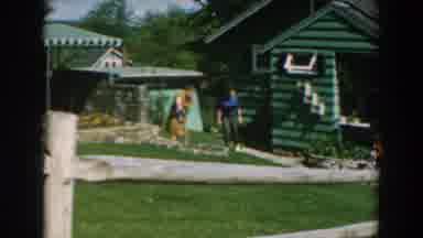 GREECE-1962: Family Gardening In Backyard On Sunny Day