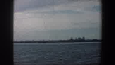 New York City (1960): Distant View Of Ellis Island And The Statue Of Liberty On A