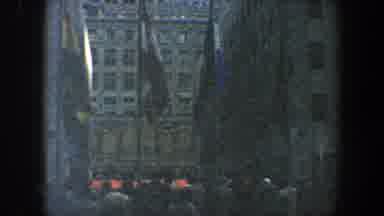 New York City (1960): A Group Of People Gathering On A Public Square With Flags