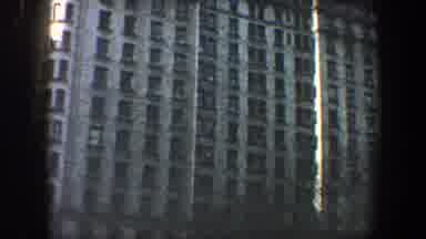 New York City (1960): Camera Pans Downward Across Side And Corner Of Multiple