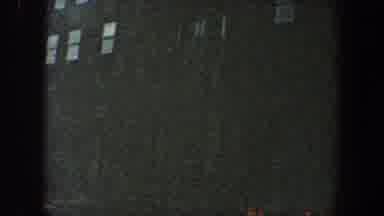 New York City (1960): The Exterior Of A Large Building Where Some Vehicles Are