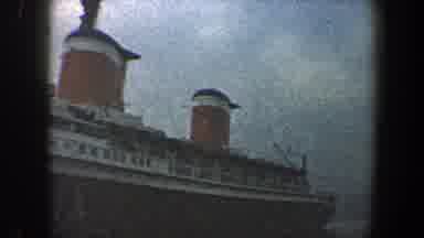 New York City (1960): Camera Pans To Show Length Of Ship In Port Black Smoke