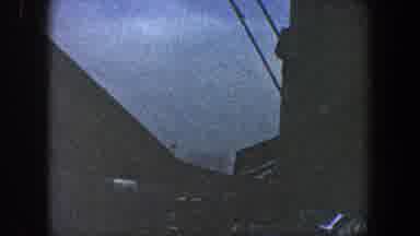 New York City (1960): View Of Shaded Beige Building Against Blue Sky On A Clear