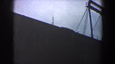 New York City (1960): Video Panning Across A Dark Object With Beams And Blank Sky