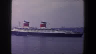 New York City (1960): View Of Red Black And White Ship In Blue Ocean Water On A