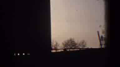 New York City (1960): View Of Large Building Against Pale Blue And Gold Sunset