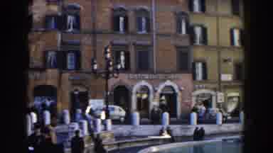 Rome Italy (1959): A Clip Showing Tall Buildings Vintage Cars And Rail Trains