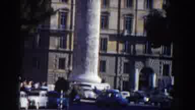 Rome Italy (1959): View Of Grey Statue In Front Of Brown Building On A Sunny Day