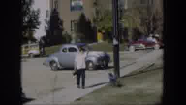 Nevada (1954): A Man Waving And Turning Away To Walk Down A Sidewalk Near A