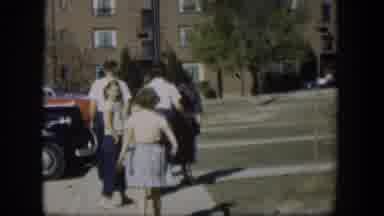 Nevada (1954): Two Girls Wave At Their Audience Behring Their Parents