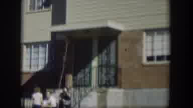 Nevada (1954): View Of Tan And Red Brick Building On A Bright Sunny Day