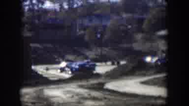 Nevada (1954): Multiple Drivers Are Pulling Into An Apartment Complex In Daylight