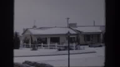 Nevada (1954): Blue Delivery Truck Driving Through A Snowy Neighborhood In The s