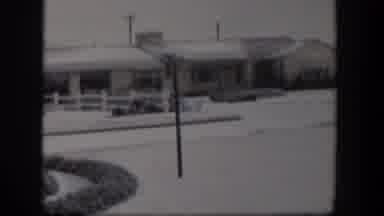 Nevada (1954): Snowy Winter Day In A Local Neighborhood Showing Daily Life In