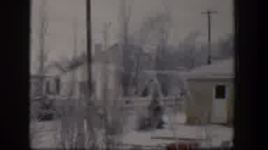 Nevada (1954): Snow Covers The Backyards Of A Housing Area Filled With Single