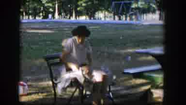 Nevada (1954): A Woman Knits With Her Hands While Her Son Plays Behind Her
