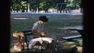 Nevada (1954): Young Boy And Adult Woman At A Park Bench And Picnic Table