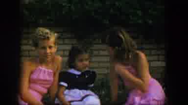 Nevada (1954): Two Girls Wearing Pink Dresses And One Girl Wearing A Blue And