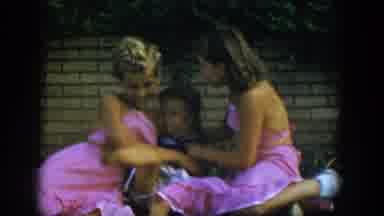 Nevada (1954): Two Sisters In Pink Are Having Fun With Their Youngest Sister