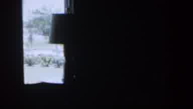 NEVADA-1954: Dark Room With Lamp Visible Near Window