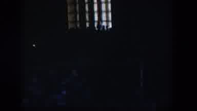 NEVADA-1954: Dark Room Interior with Lamp and Window Bars