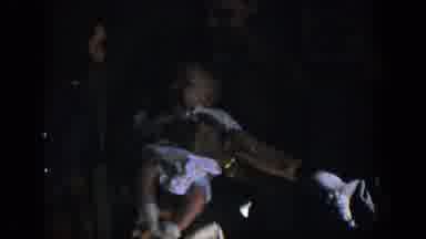 Nevada (1954): A Man Holds His Baby As A Woman Plays With Him