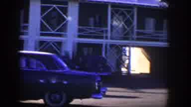 Nevada (1954): A Fleet Of Cars Parked In Front Of A Large Building