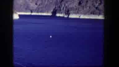 Nevada (1954): View Of A Coastal Area With Blue Sea And Steep Rocks