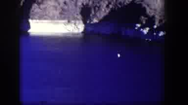 Nevada (1954): Lake View Then Scene Of People Walking Across A Street Near Golden