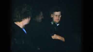 Houston Texas (1952): A Man In Sun Shades Interact With A Woman During A Party