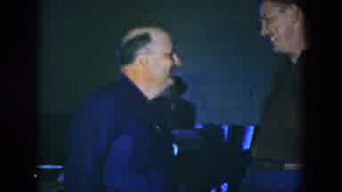 Houston Texas (1952): Two Well-Dressed Men Laugh And Joke In A Place Closed