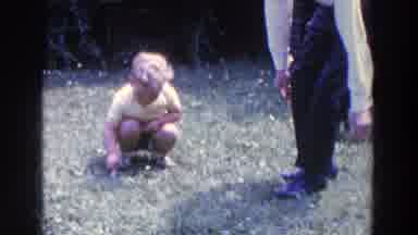 Ireland (1961): Father And Son Spend Time With Their Dog At The Park