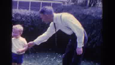 Ireland (1961): Young Boy Tries To Look At An Object Closely Near His Eye And A