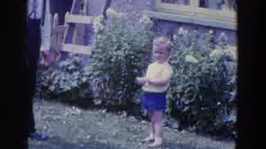 Ireland (1961): Young Boy Enjoying A Good Day Outside In The Garden With The