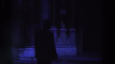 Ireland (1961): Dark Image Of A Man Pointing Up At A Building And Walking