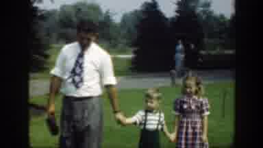 Washington DC (1948): Father Strolls Along Hand-In-Hand With His Young Son And