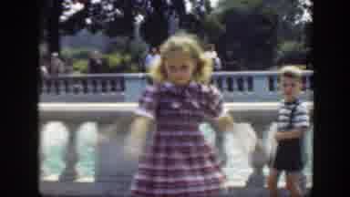 Washington DC (1948): A Girl Whirls In Circles As A Boy Approaches Her