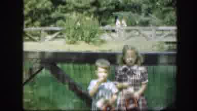 Washington DC (1948): Two Kids Tossing Eating Popcorn Near A Fake Lake Of A Park