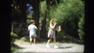 Washington DC (1948): A Boy And A Girl Playing In The Garden Close To The Bush